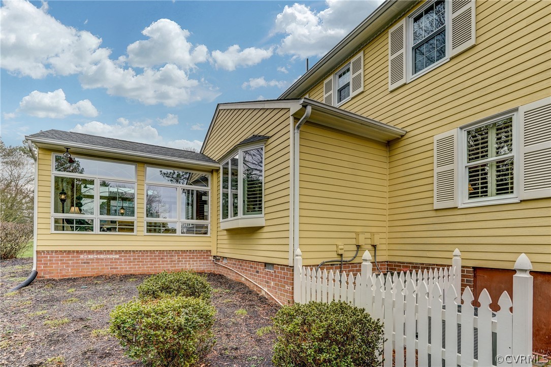 104 Tudor Road Colonial Heights, VA 23834 - Photo 50 of 50 a front view of a house with a garden