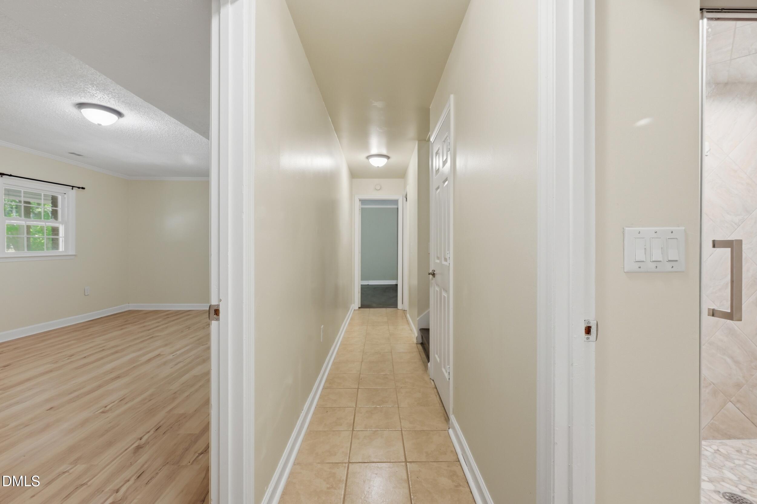 7811 Buckhorn Road Hillsborough, NC 27278 - Photo 24 of 47 a view of a room with wooden floor