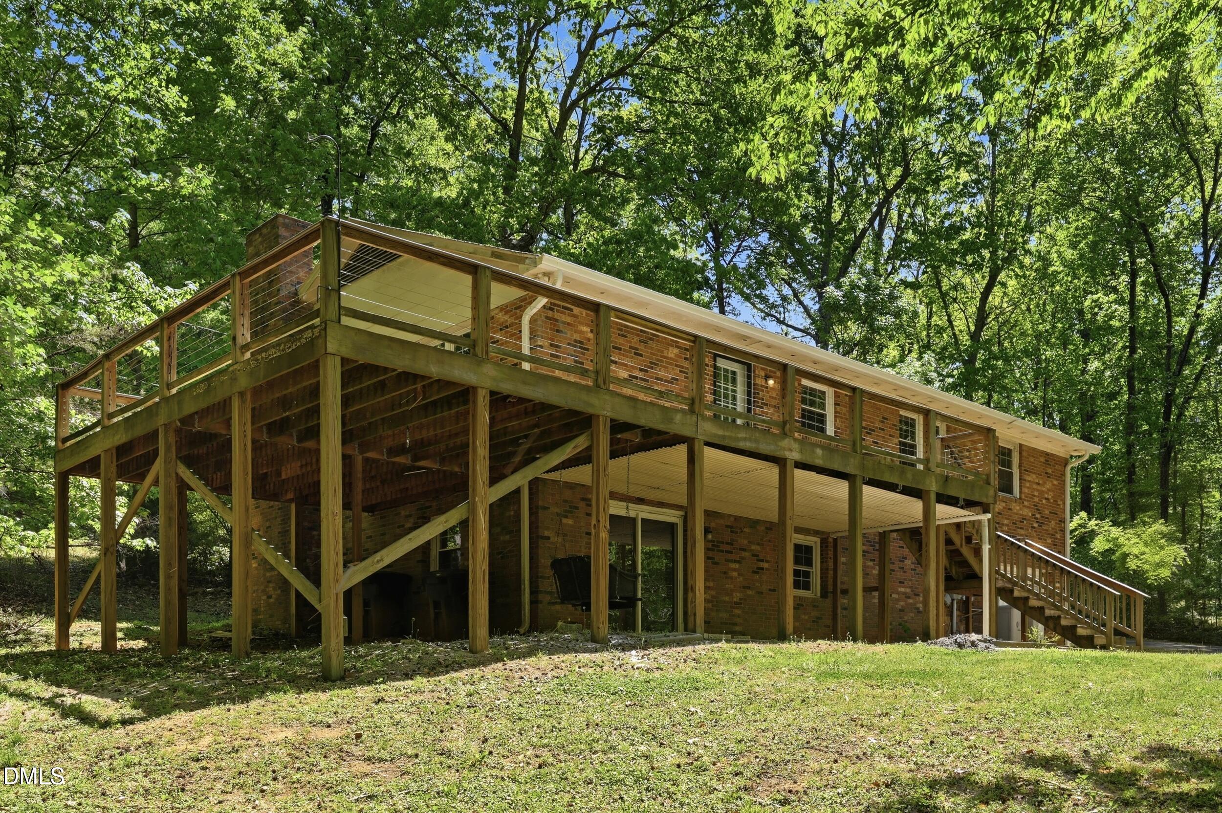 7811 Buckhorn Road Hillsborough, NC 27278 - Photo 39 of 47 a view of a house with a yard