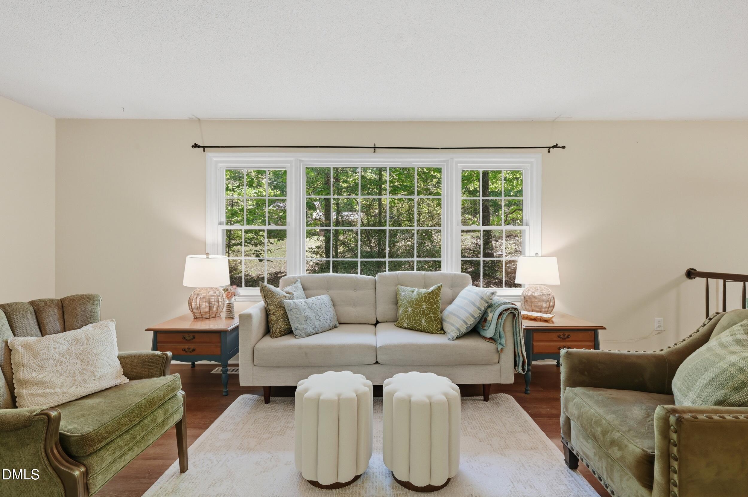 7811 Buckhorn Road Hillsborough, NC 27278 - Photo 8 of 47 a living room with furniture and a large window