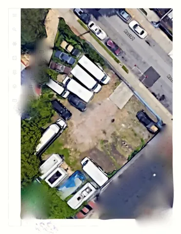 an aerial view of house with a large pool