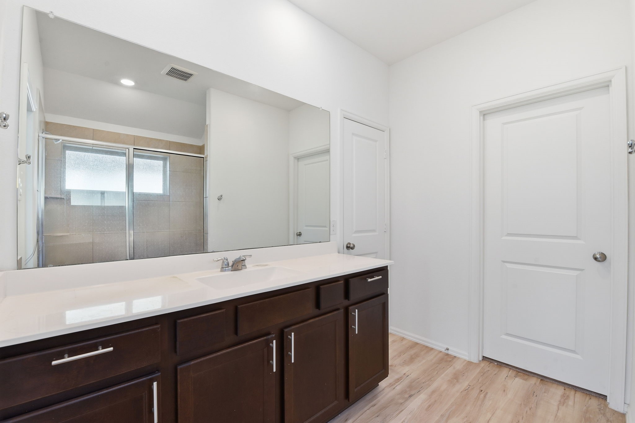 9010 Brazos Drive Baytown, TX 77521 - Photo 23 of 37 a bathroom with a sink and a mirror