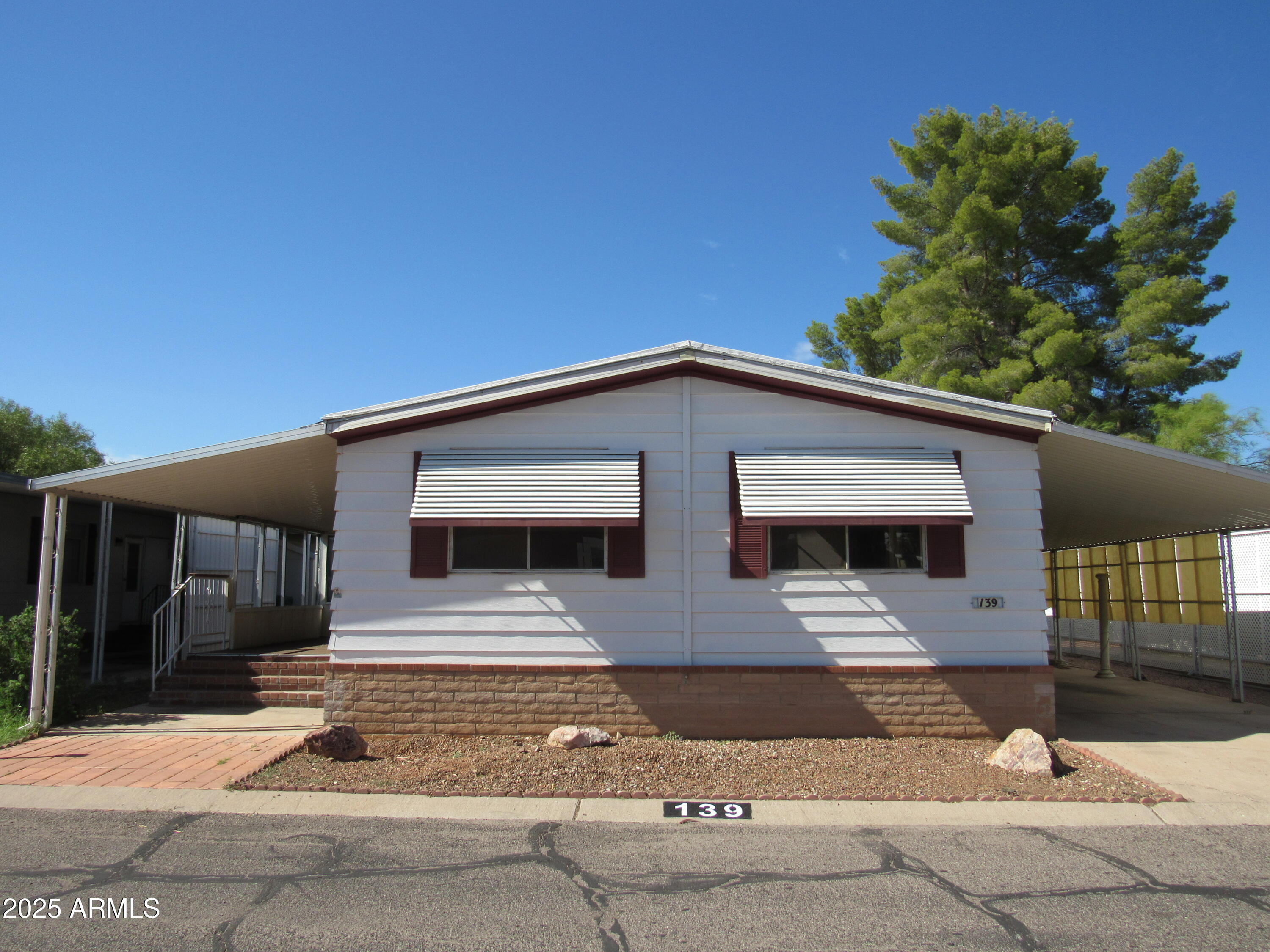 a front view of a house with a garage