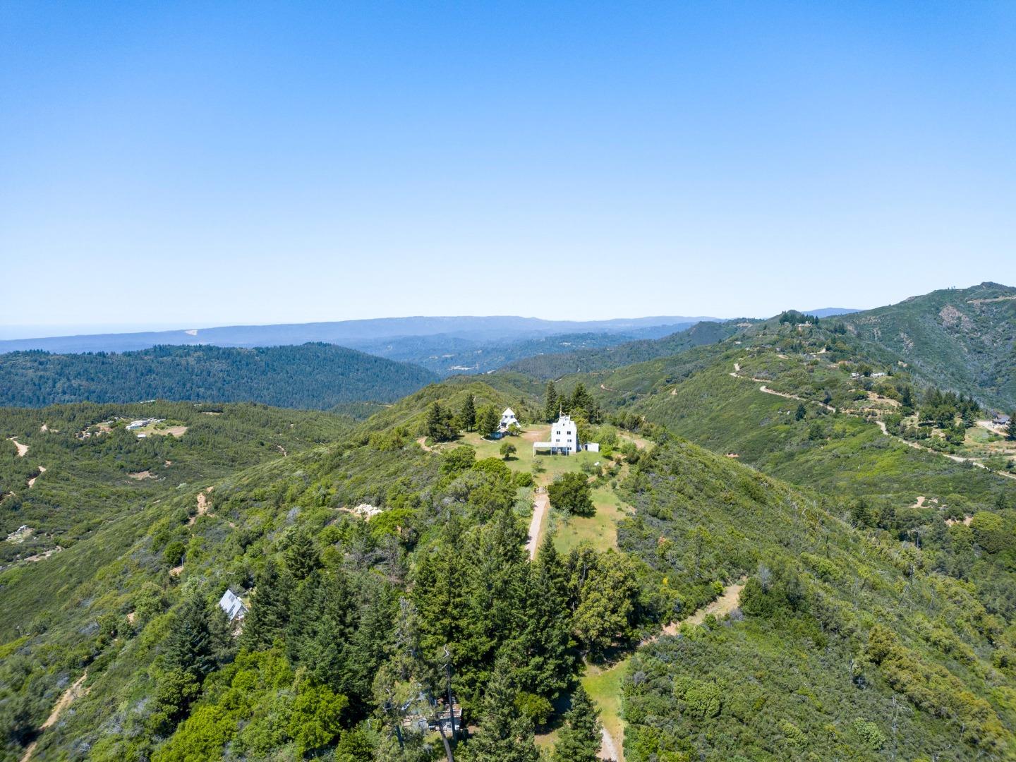 101 Silverline Road Los Gatos, CA 95033 - Photo 1 of 19 a view of a lush green field with lots of trees in it