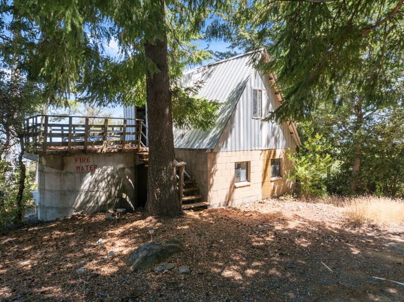 101 Silverline Road Los Gatos, CA 95033 - Photo 11 of 19 a view of house with backyard and outdoor seating
