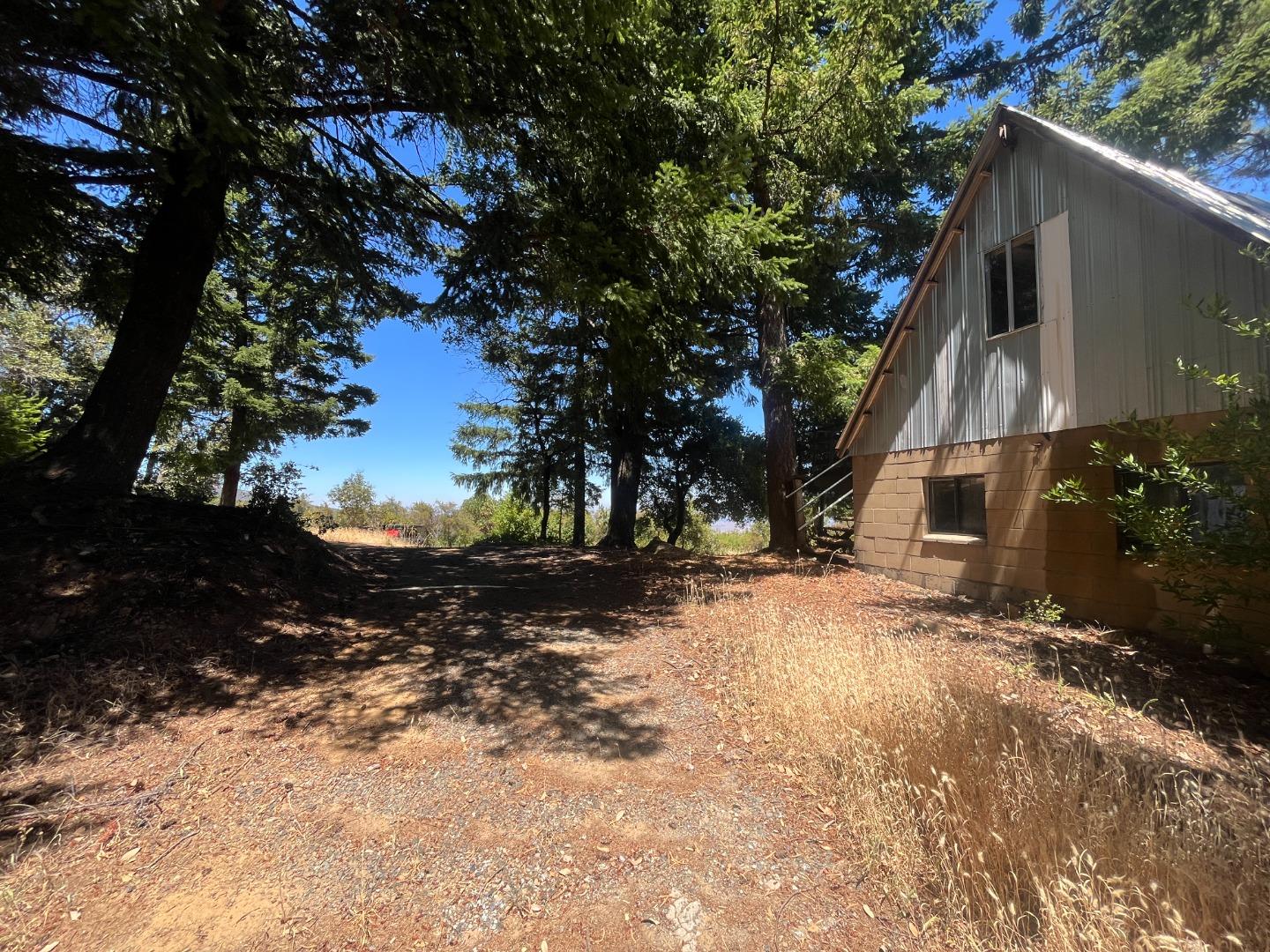 101 Silverline Road Los Gatos, CA 95033 - Photo 17 of 19 a view of a house with a tree in the background