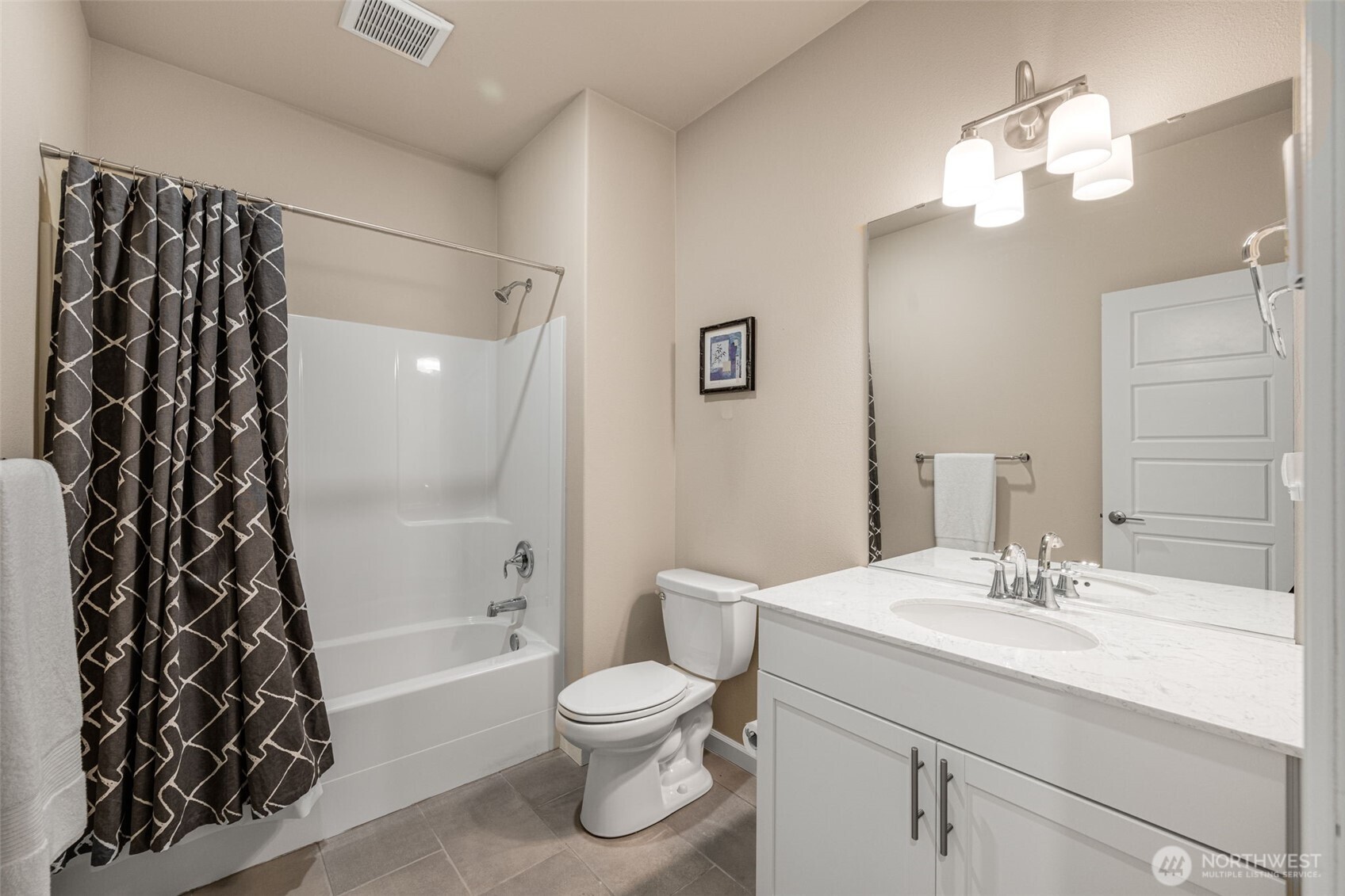 216 178th Street Southeast Bothell, WA 98012 - Photo 37 of 40 a bathroom with a sink and a mirror