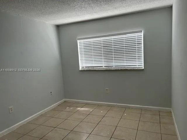 a view of an empty room with window