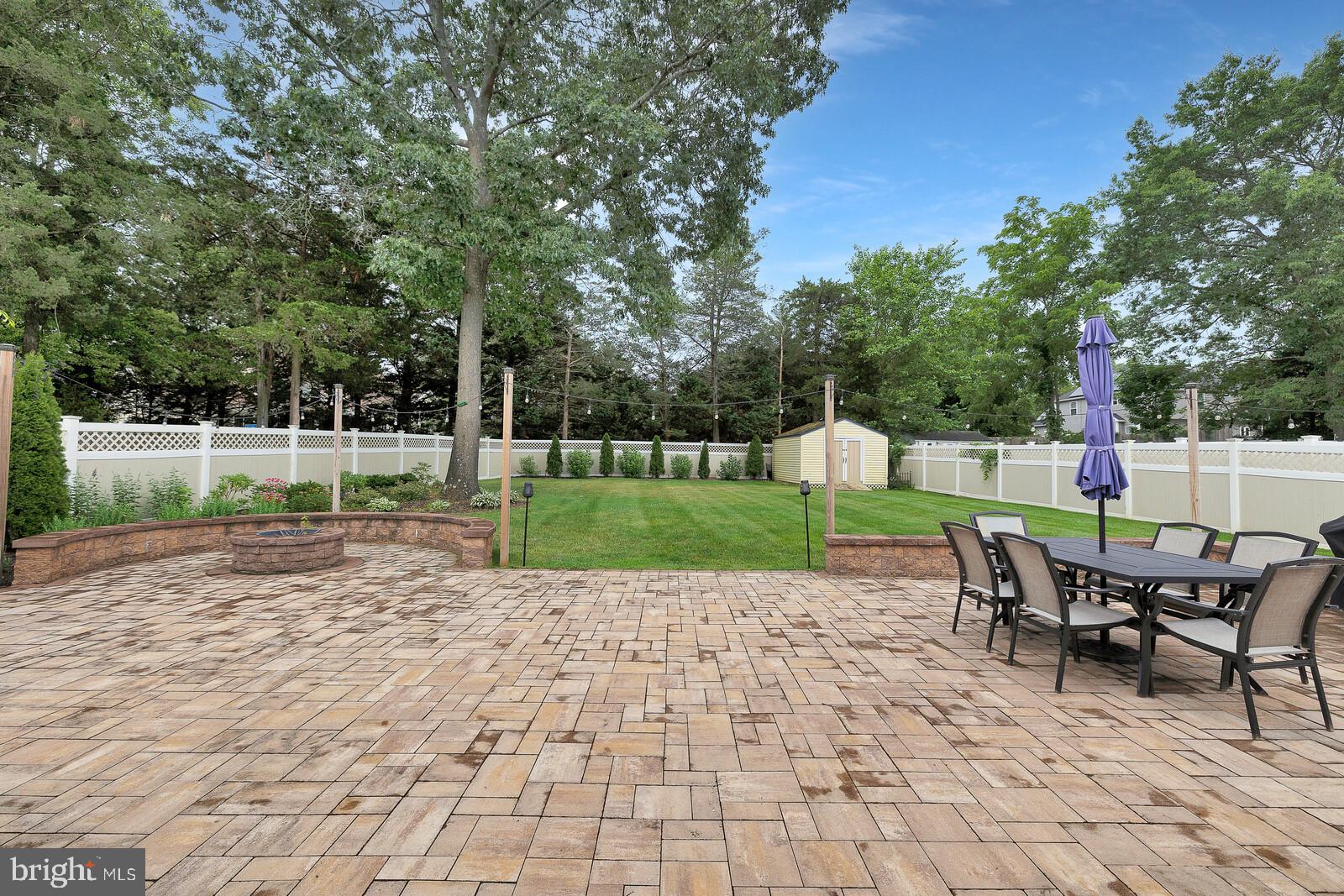 505 Buxton Road Toms River, NJ 08755 - Photo 28 of 31 Serene backyard oasis with patio charm.