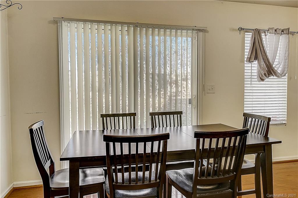 7029 Sunman Road Charlotte, NC 28216 - Photo 12 of 33 a view of a city from a dining room