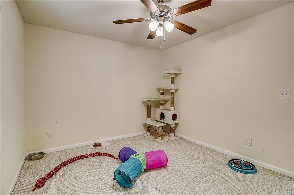 7029 Sunman Road Charlotte, NC 28216 - Photo 24 of 33 wooden floor with a ceiling fan