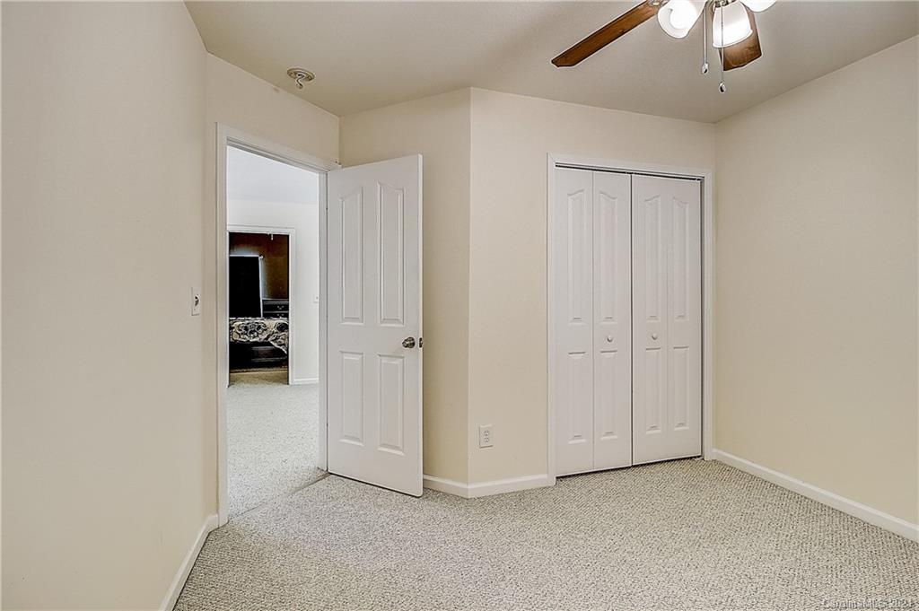 7029 Sunman Road Charlotte, NC 28216 - Photo 27 of 33 wooden floor and closet in a room