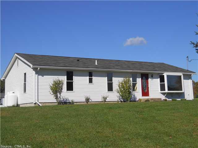 253 Chewink Road Chaplin, CT 06235 - Photo 1 of 1 a front view of house with yard