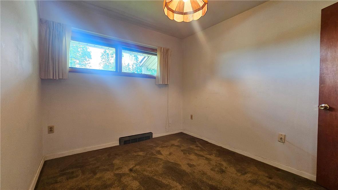 2529 Ringhoffer Road Hellertown, PA 18055 - Photo 15 of 33 A well-lit bedroom features plush carpeting and a large window providing ample natural illumination.