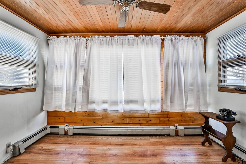 554 Brook Road Milton, MA 02186 - Photo 12 of 22 a spacious bedroom with a bed and a window