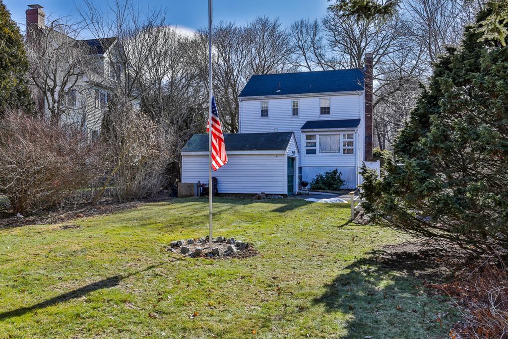 554 Brook Road Milton, MA 02186 - Photo 22 of 22 a front view of house with yard and trees