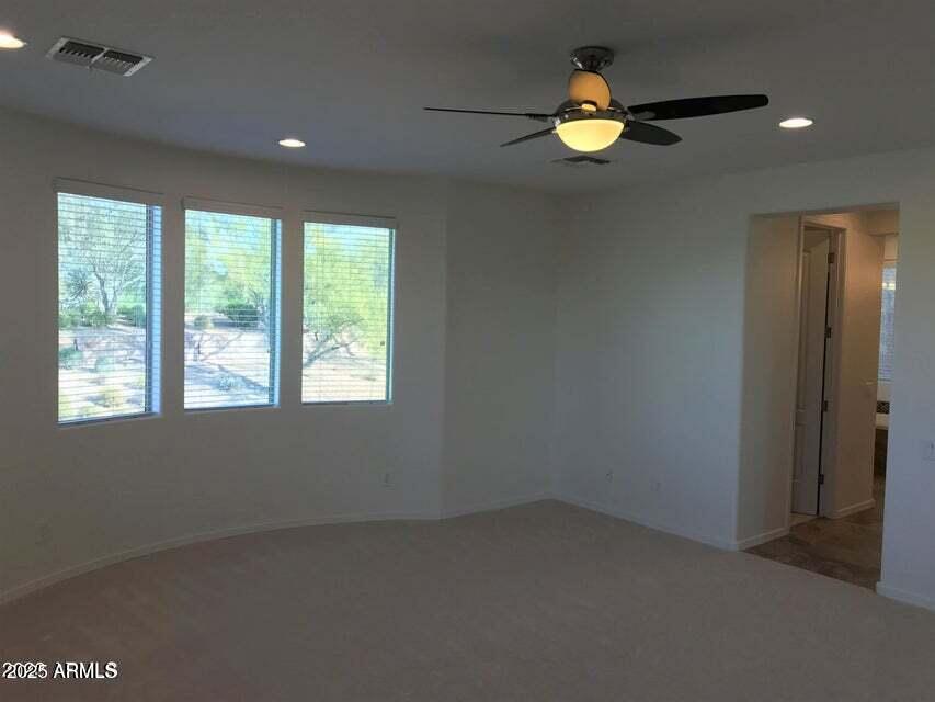 3838 East Cat Balue Drive Phoenix, AZ 85050 - Photo 15 of 22 an empty room that has a window