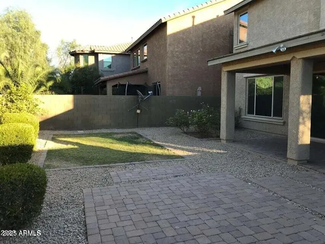 a view of a house with swimming pool