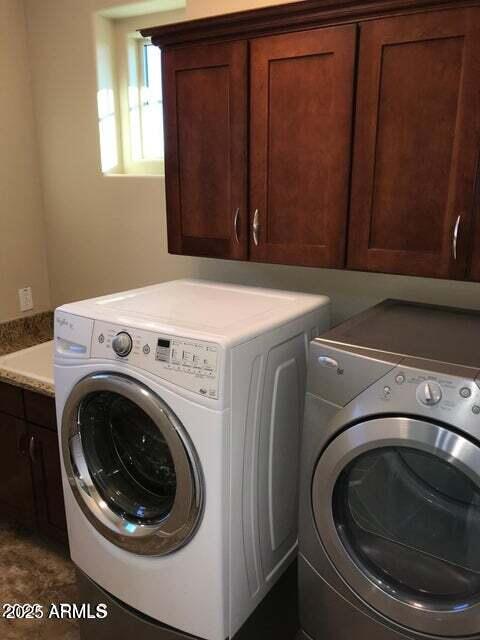 3838 East Cat Balue Drive Phoenix, AZ 85050 - Photo 19 of 22 a utility room with dryer and washer