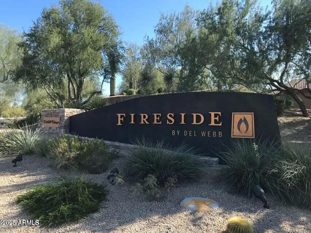 a view of a park that has sign board