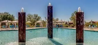 a view of a house with a yard and table from balcony