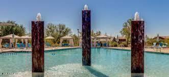 3838 East Cat Balue Drive Phoenix, AZ 85050 - Photo 22 of 22 a view of a house with a yard and table from balcony