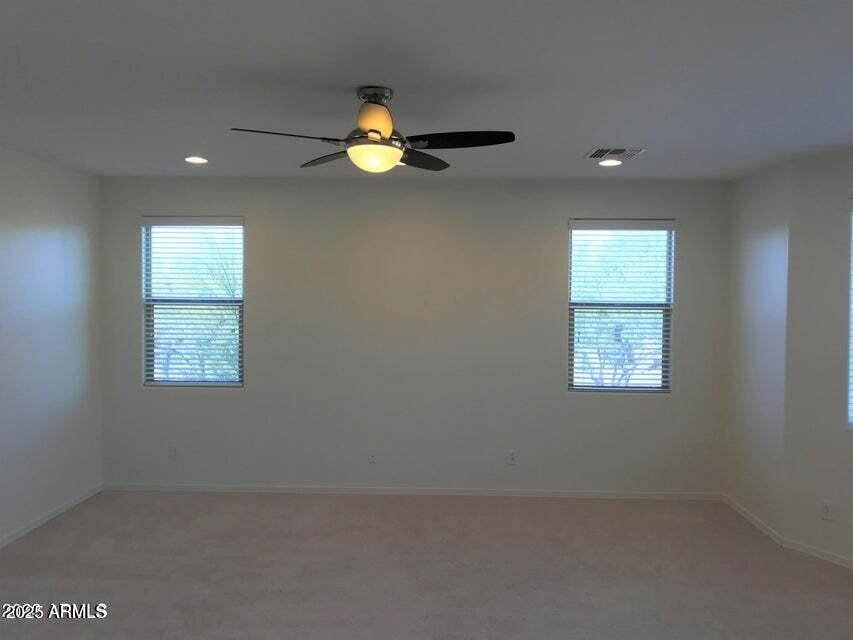 3838 East Cat Balue Drive Phoenix, AZ 85050 - Photo 10 of 22 an empty room with a window