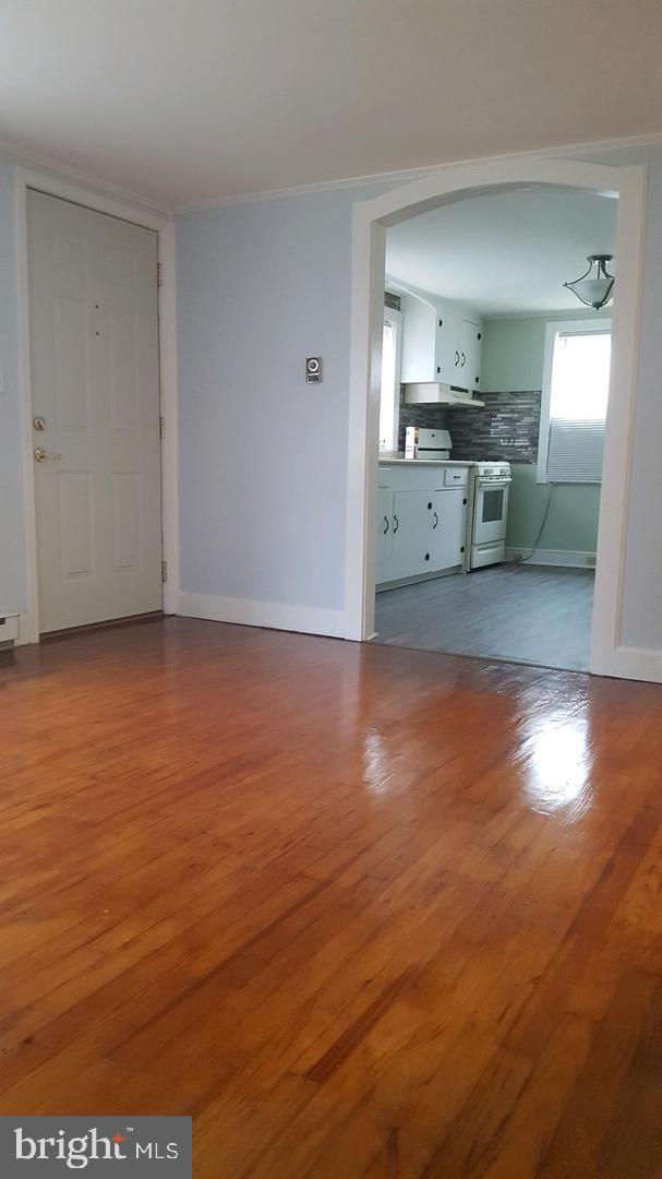 30225 Frankford School Road Frankford, DE 19945 - Photo 2 of 10 a view of a kitchen with wooden floor and a kitchen