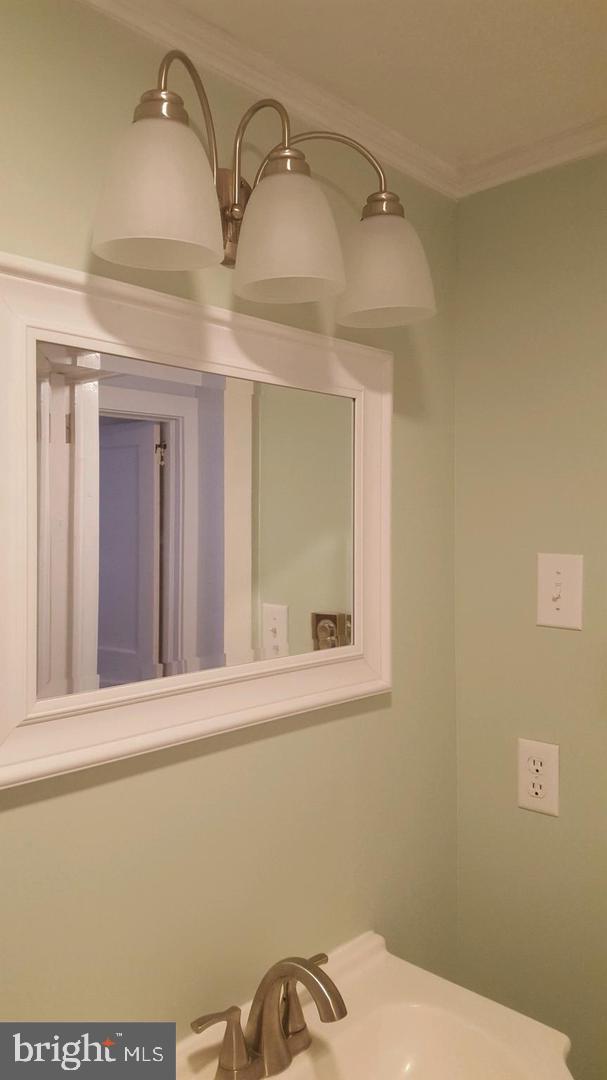 30225 Frankford School Road Frankford, DE 19945 - Photo 6 of 10 a view of a bathroom with a sink