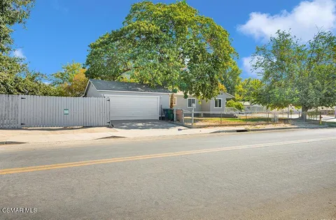 a house view with a outdoor space