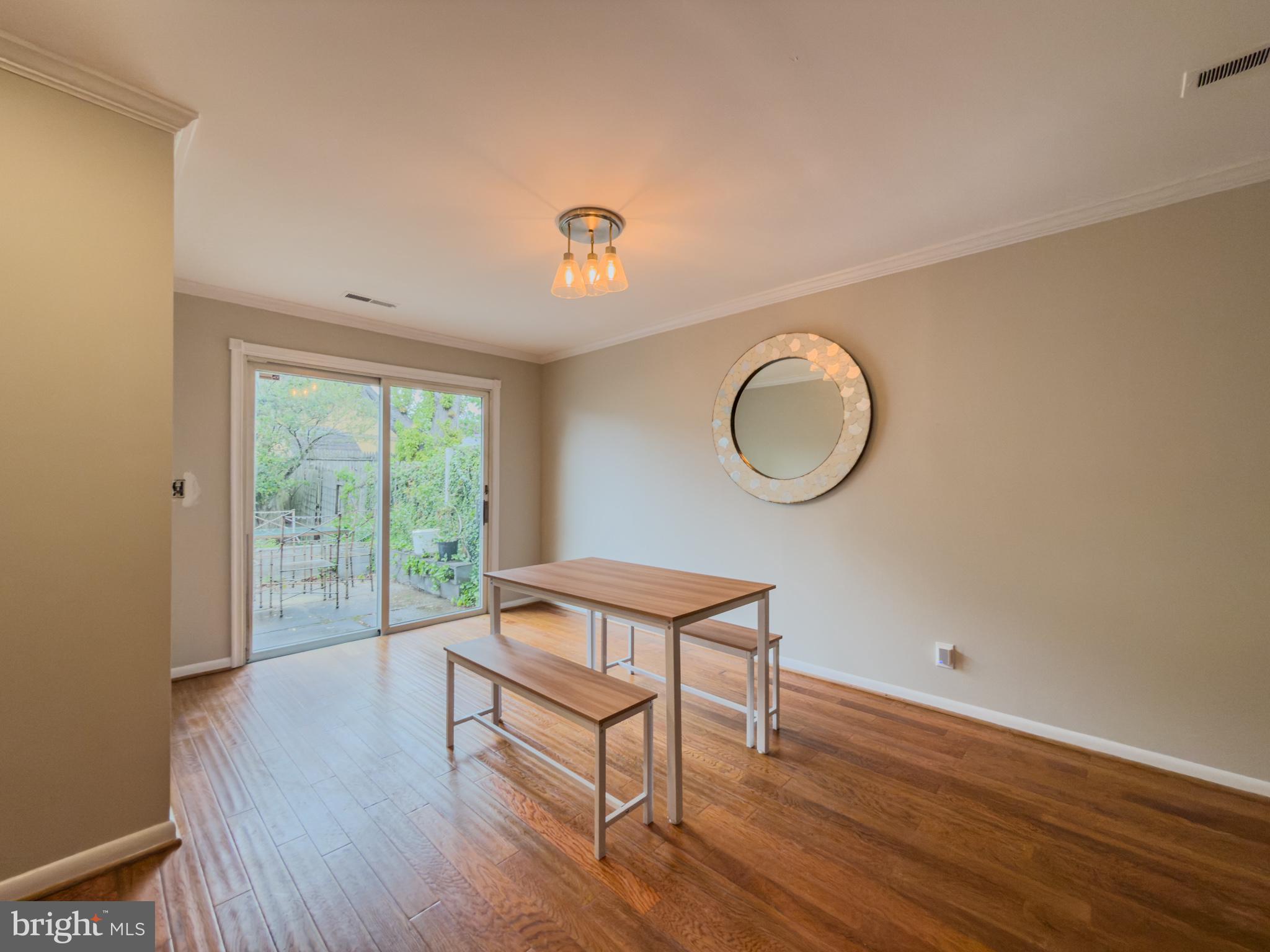 14900 Hydrus Road Silver Spring, MD 20906 - Photo 12 of 33 Bright and airy dining space awaits.