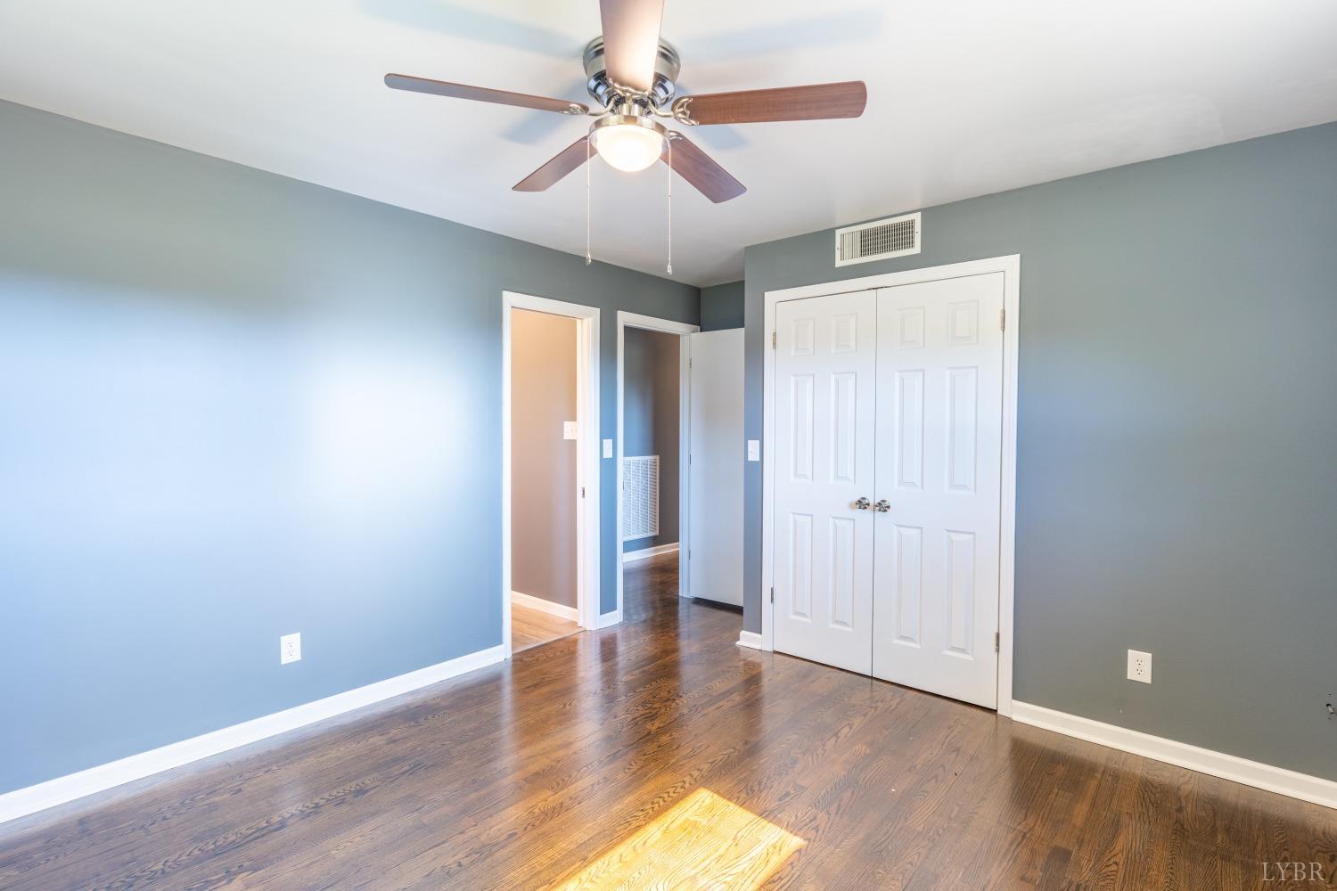 5461 Red House Road Rustburg, VA 24588 - Photo 11 of 47 wooden floor in an empty room with a window