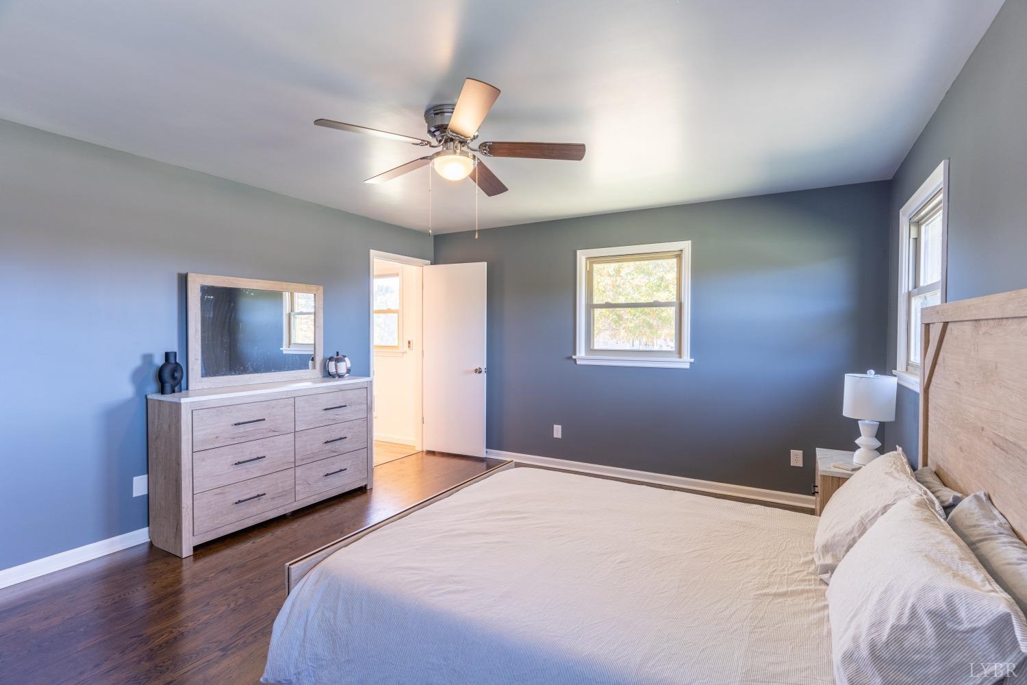 5461 Red House Road Rustburg, VA 24588 - Photo 14 of 47 a bedroom with a bed and a dresser