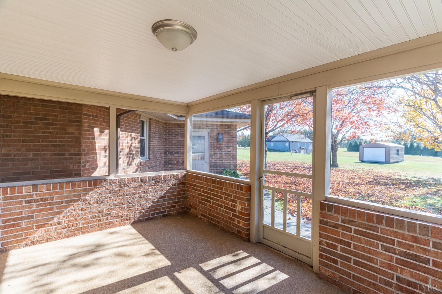 5461 Red House Road Rustburg, VA 24588 - Photo 20 of 47 a view of front door with lounge chair