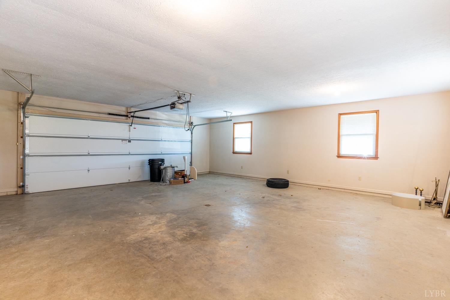 5461 Red House Road Rustburg, VA 24588 - Photo 23 of 47 an empty room with windows