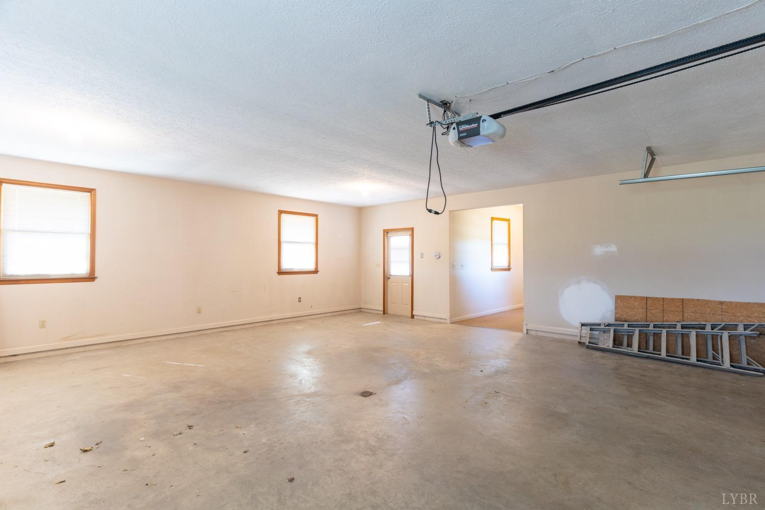5461 Red House Road Rustburg, VA 24588 - Photo 24 of 47 an empty room with windows and closet