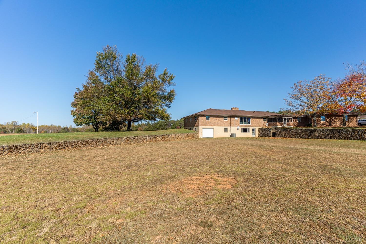 5461 Red House Road Rustburg, VA 24588 - Photo 42 of 47 a front view of a house with a yard