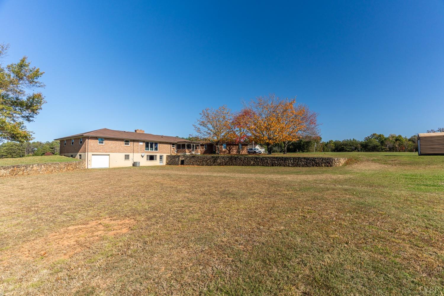 5461 Red House Road Rustburg, VA 24588 - Photo 43 of 47 a front view of a house with a yard