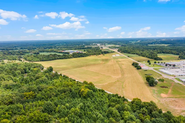 a view of a lake with a city