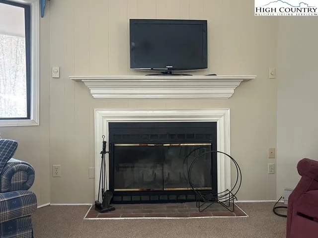 a bathroom with a granite countertop toilet a sink and bathtub