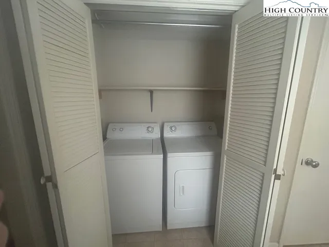 a view of a golf course with a house