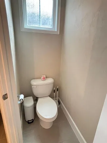 a bathroom with a toilet and a sink