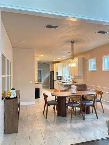 a view of a dining room with furniture