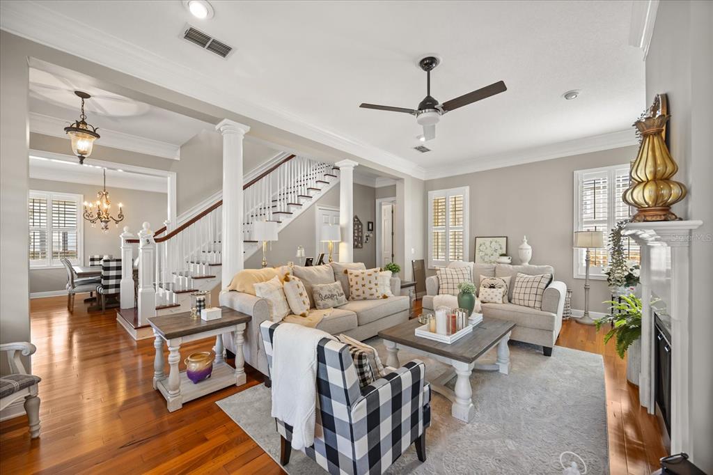 815 Spring Park Loop Celebration, FL 34747 - Photo 12 of 51 a living room with furniture and a fireplace