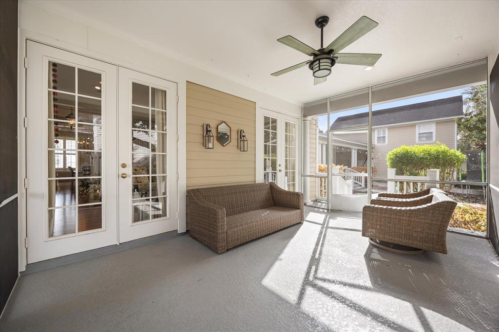 815 Spring Park Loop Celebration, FL 34747 - Photo 35 of 51 a living room with furniture and a large window