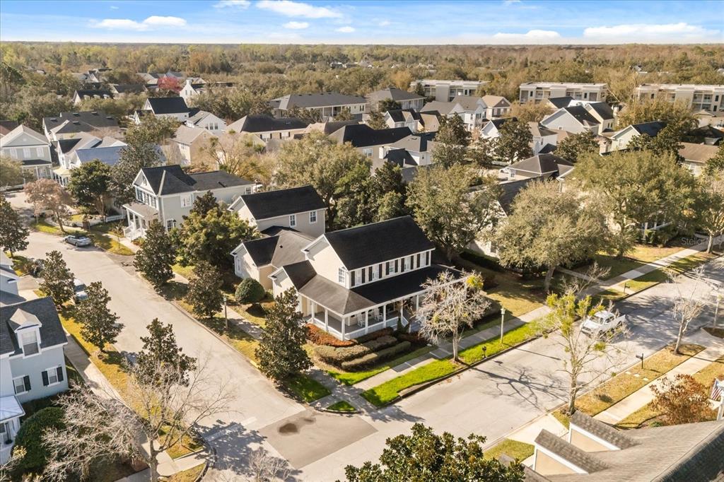 815 Spring Park Loop Celebration, FL 34747 - Photo 49 of 51 an aerial view of residential house with outdoor space