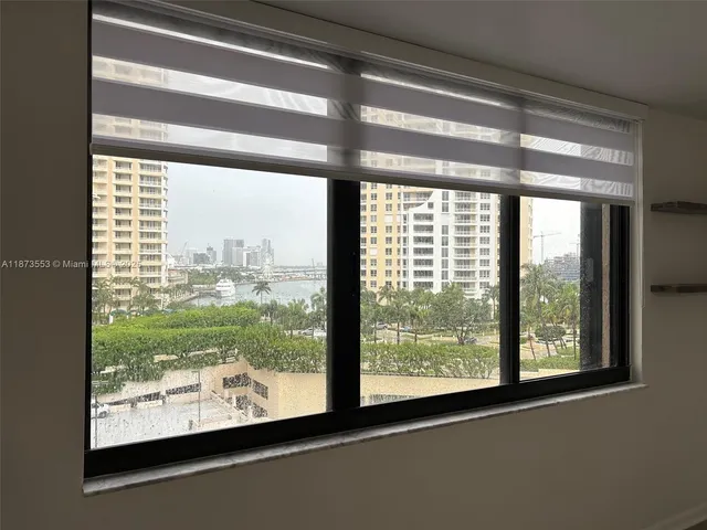 a view of a room and window