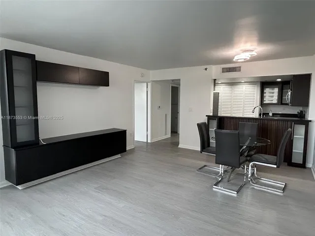 a view of a workspace with furniture