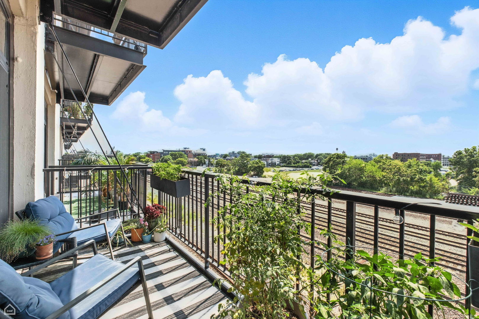 1524 South Sangamon Street, Unit 414S Chicago, IL 60608 - Photo 11 of 12 a view of balcony with furniture