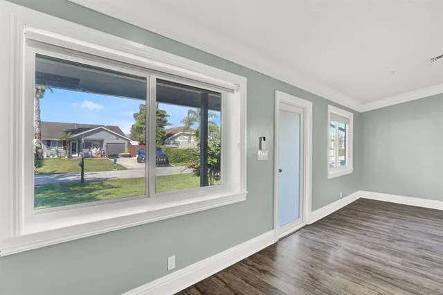 a view of a room that has a window